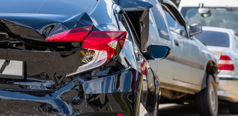 Car rear-ended by another vehicle, indicating rear-end collision cases.