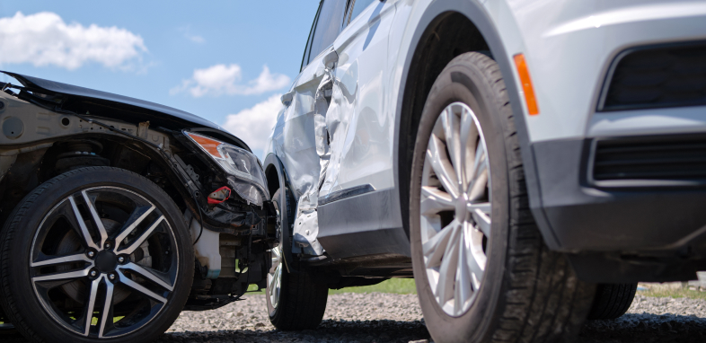 Two cars involved in a T-bone collision, illustrating side-impact accident cases.