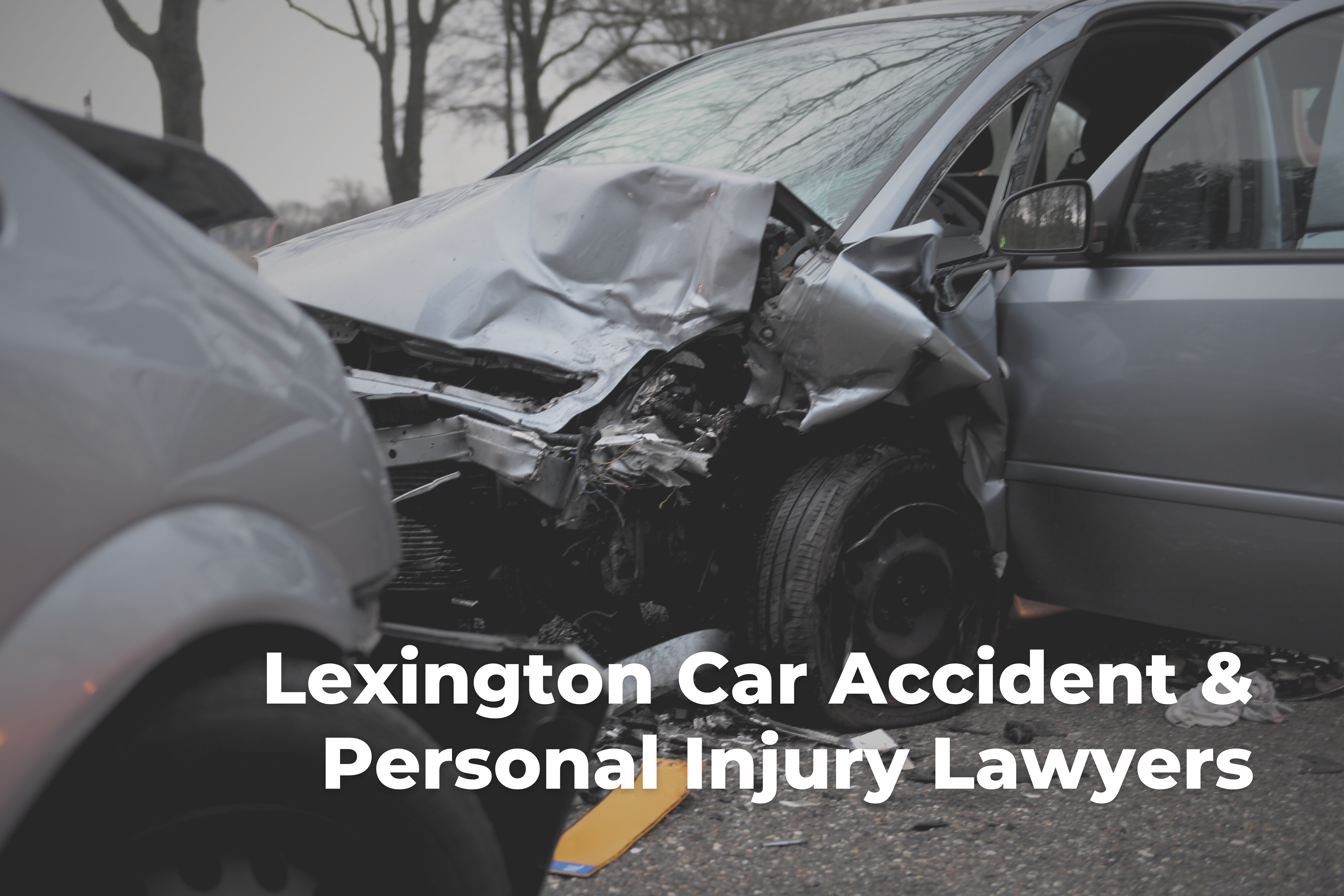 Head on collision car accident with "Lexington car Accident & Personal Injury Lawyers" written on it.